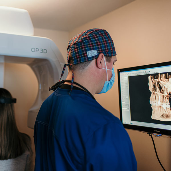 Doctor setting up 3-D printer