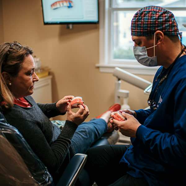 Doctor explaining invisalign to patient
